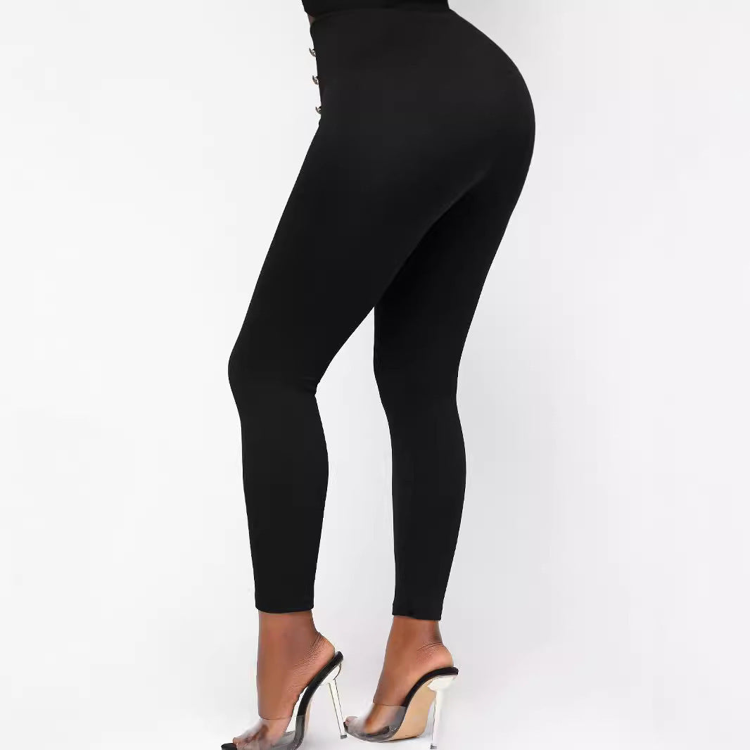 Pantalones ajustados de cintura alta con botones y color liso