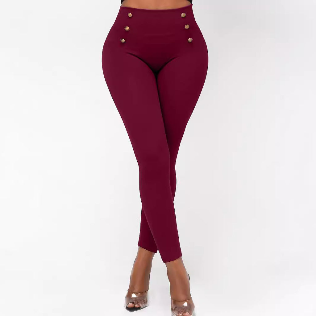 Pantalones ajustados de cintura alta con botones y color liso
