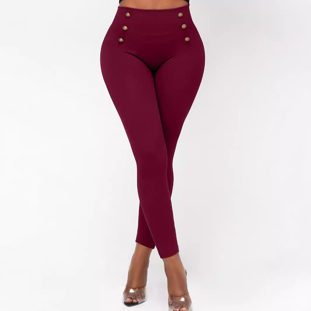 Pantalones ajustados de cintura alta con botones y color liso